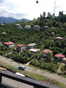 an aerial view of a town with houses on a hill at Nodari in Batumi