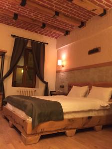 Postelja oz. postelje v sobi nastanitve Assos Kervansaray Hotel - Special Category
