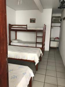 Postel nebo postele na pokoji v ubytování Hotel Pousada Hamburgo