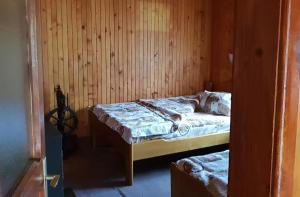 Postel nebo postele na pokoji v ubytování Domacinstvo Prentovic