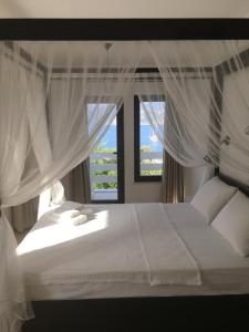 Säng eller sängar i ett rum på Gala Selimiye
