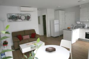 A seating area at Apartamentos Balcón de Nerja - Adults Only