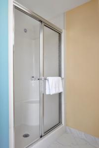 Postel nebo postele na pokoji v ubytování Breezeway Boutique Hotel