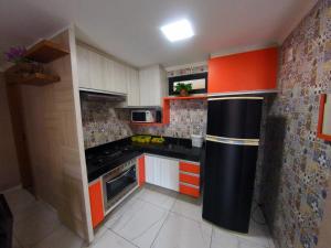 Virtuve vai virtuves zona naktsmītnē Residence Iracema Porto
