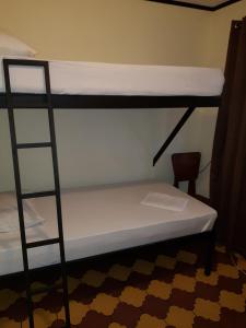 Voodi või voodid majutusasutuse Hostel Dodero toas