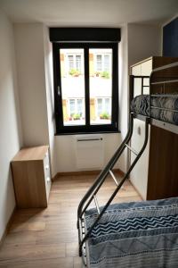 Postel nebo postele na pokoji v ubytování Le cyclade, appartement de standing en hyper-centre.