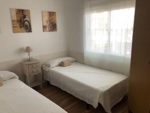 A bed or beds in a room at Vilasardemarlux2