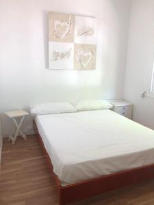A bed or beds in a room at Vilasardemarlux2