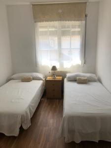 A bed or beds in a room at Vilasardemarlux2