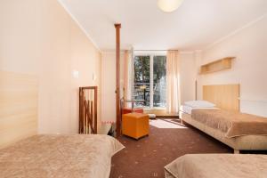 Postel nebo postele na pokoji v ubytování Kaprys + 37 fotografií