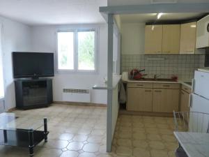 Appartement quartier résidentiel 1 Chambreにあるキッチンまたは簡易キッチン