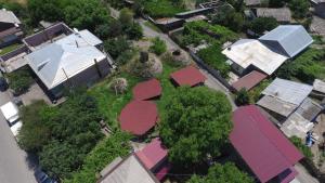 an overhead view of a city with houses and trees at Hotel Beni in Akhaltsikhe