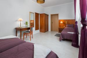 Łóżko lub łóżka w pokoju w obiekcie Morskie Apartamenty "Zefir" "Notos" "Loft" "Gniazdo"