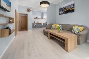 Kuchnia lub aneks kuchenny w obiekcie Morskie Apartamenty "Zefir" "Notos" "Loft" "Gniazdo"