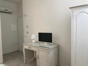 TV a/nebo společenská místnost v ubytování MarMè