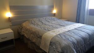 Cama o camas de una habitación en Arequipa Suites Plaza