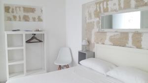 Postel nebo postele na pokoji v ubytování Appartamenti e Camere Silva Trapani