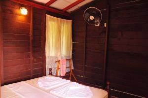Letto o letti in una camera di Pidurangala View Home Stay