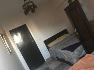 A bed or beds in a room at Wake Up! Cairo Hostel