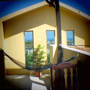 Balkón nebo terasa v ubytování Dulan Groundnut Backpacker Hostel