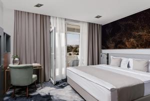 Voodi või voodid majutusasutuse Hotel River Park toas