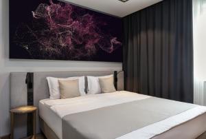 Voodi või voodid majutusasutuse Hotel River Park toas