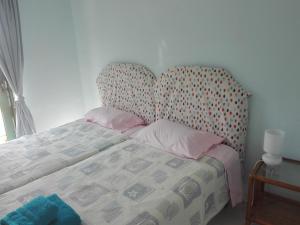 Postel nebo postele na pokoji v ubytování Pasha Bay Residence