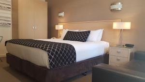 Postel nebo postele na pokoji v ubytování Largs Pier Hotel