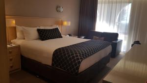 Postel nebo postele na pokoji v ubytování Largs Pier Hotel