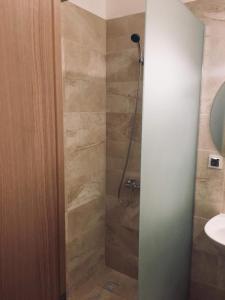 Ένα μπάνιο στο Cluj City Iris Appartment +40 φωτογραφίες