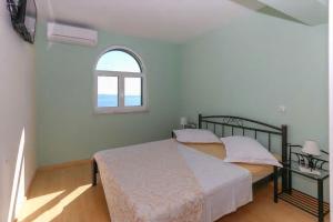 Postel nebo postele na pokoji v ubytování Villa Hacienda Grof
