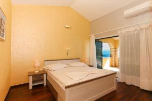 Postel nebo postele na pokoji v ubytování Villa Hacienda Grof