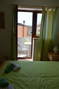 Postel nebo postele na pokoji v ubytování Apartments Lans