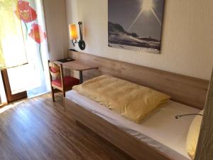 Ένα ή περισσότερα κρεβάτια σε δωμάτιο στο Hotel Heuberger Hof, Wehingen