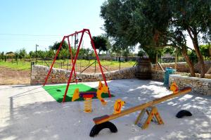 Ο χώρος παιχνιδιού για παιδιά στο Agriturismo Il Tenimento