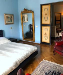Postelja oz. postelje v sobi nastanitve Appartamento Palazzo Bufalini