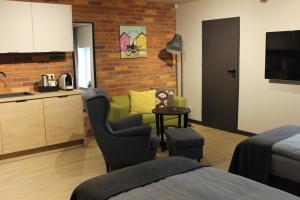 Kuchnia lub aneks kuchenny w obiekcie Apartamenty Centrum Park Sowińskiego 19