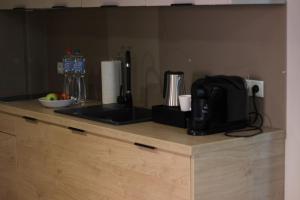Zestaw do parzenia kawy i herbaty w obiekcie Apartamenty Centrum Park Sowińskiego 19