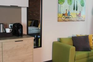 Kuchnia lub aneks kuchenny w obiekcie Apartamenty Centrum Park Sowińskiego 19