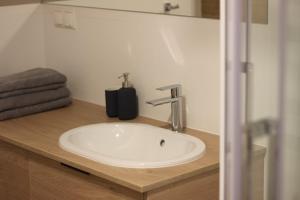 Łazienka w obiekcie Apartamenty Centrum Park Sowińskiego 19