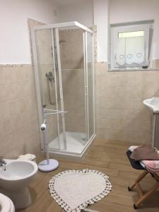 Et badeværelse på Il Ghiretto Appartamento