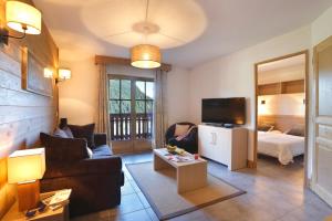 Et tv og/eller underholdning på Résidence Goélia Le Grand Ermitage