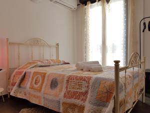 A bed or beds in a room at Terra del Sole Vittoria