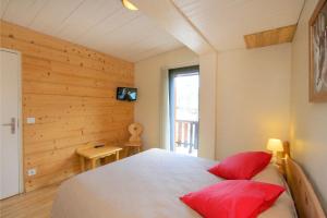 Postel nebo postele na pokoji v ubytování Hotel le Sherpa