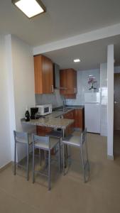 Kuchnia lub aneks kuchenny w obiekcie As Apartamentos Turisticos