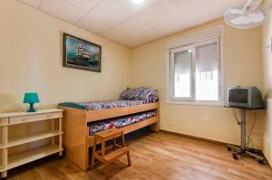 Postel nebo postele na pokoji v ubytování Casa Frente Al Mar