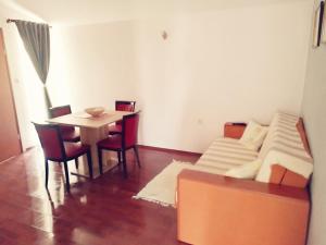 Postel nebo postele na pokoji v ubytování Apartmani Babić Vir