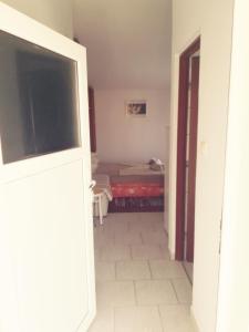 Postel nebo postele na pokoji v ubytování Apartmani Babić Vir