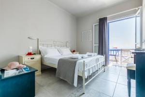 Postel nebo postele na pokoji v ubytování Pension Oniro