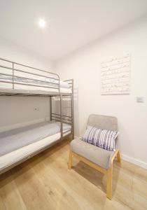 A bed or beds in a room at Apartamento Centro-Playa II